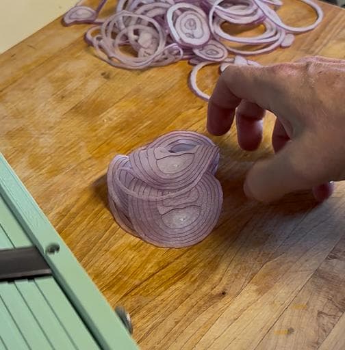 Slicing onions with Benriner mandolin